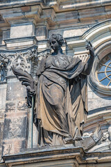 Old statue of a sensual Baroque Era woman in downtown of Dresden, Germany, details, closeup.