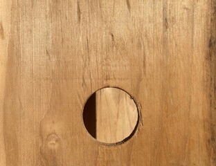 a round hole in a plywood panel