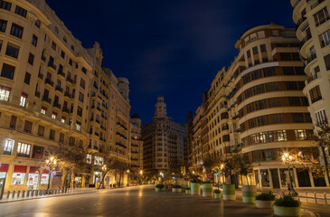 Fototapeta na wymiar VALENCIA, SPAIN - FEBRUARY 16, 2022: The Ayuntamiento Square at dusk.