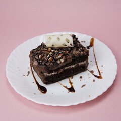 Hazelnut Pastry with Fork In White Plate