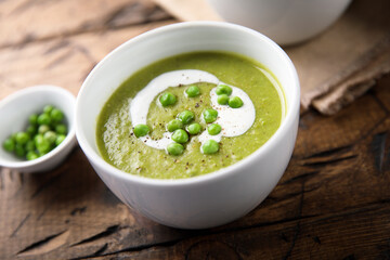 Homemade green pea soup with cream
