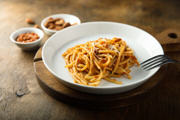 Pasta with red pesto and cheese
