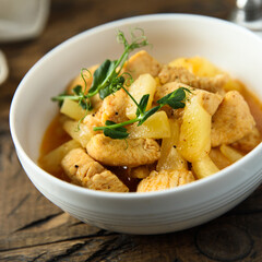 Homemade chicken ragout with pineapple