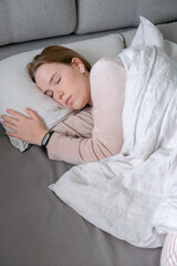 Woman sleeping in bed. Circadian rhythm optimization. Fight insomnia.Recovery of health in a dream.