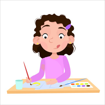 Curly-haired girl draws with paints at the table