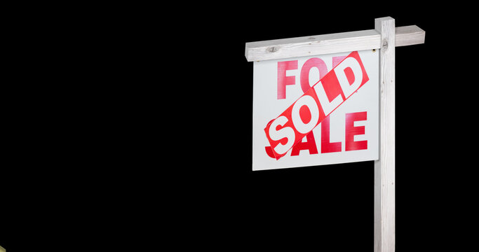 Image of sold text on house for sale sign with gold confetti falling on black background