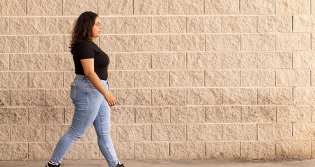 Young girl posing in the street for actress book