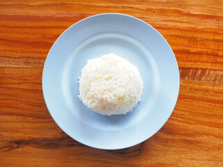 white cooked rice on blue plate