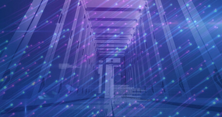 Image of blue and pink lights moving over servers