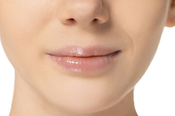 Cropped close-up image of plump female lips isolated over white background. Cosmetology injection,...