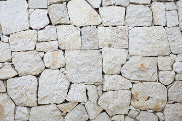 Grey and brown stones wall construction