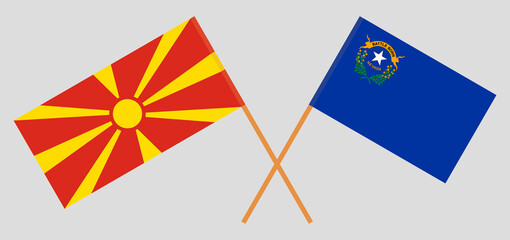 Crossed flags of North Macedonia and The State of Nevada. Official colors. Correct proportion