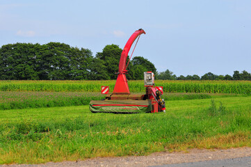 red harvesterr on a field