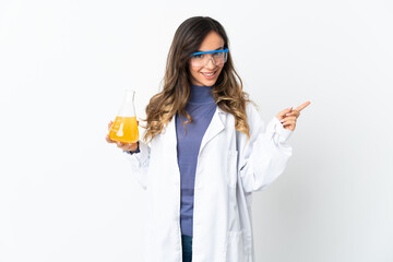 Young scientific woman isolated on white background pointing finger to the side