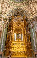 Fototapeta na wymiar VALENCIA, SPAIN - FEBRUAR 17, 2022: The baroque altar of St. Barbara chapel in church Iglesia San Juan de Ospital designed by Juan B. Perez Castiel (1686).