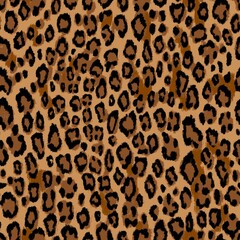 Seamless jaguar, leopard, cheetah, panther skin pattern. Animal beige and brown background with small spots