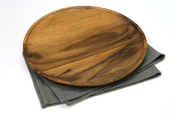 Empty wooden tray with cloth isolated on white background. Mock up. Selective focus.