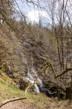 uguna waterfall among the trees