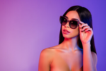 Photo of dreamy charming young woman look empty space pure skin care isolated on dark gradient background