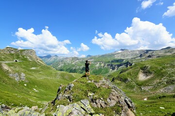 Fototapeta premium Hiking in the beautiful forest of the Alps. This is a path from mountain pass Vrsic to Slemenova spica with the look on Jalovec mountain.