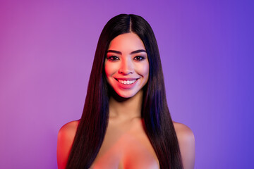 Photo of optimistic millennial brunette lady without clothes isolated on colorful color background