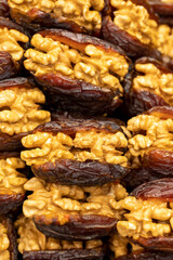 Walnut date fruit. Walnut filled dates healthy food. Close-up. local name cevizli hurma
