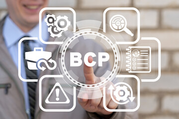 Concept of BCP Business Continuity Plan. Continuous company work. Businessman using virtual touchscreen clicks BCP abbreviation. - obrazy, fototapety, plakaty