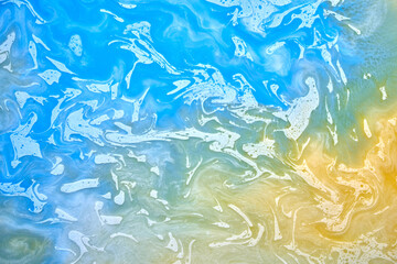 Ink abstract background, paint pattern under water, orange blue pigment acrylic stains, splashes and streaks