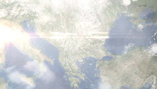 Earth zoom in from outer space to city. Zooming on Pernik, Bulgaria. The animation continues by zoom out through clouds and atmosphere into space. Images from NASA