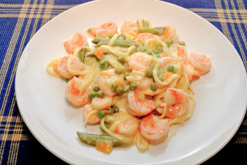 Close Up of Creamy Shrimp Scampi with Vegetables and Pasta	