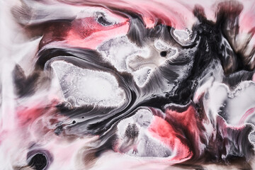 Ink abstract background, black white red paint pattern underwater, acrylic pigment stains, splashes...
