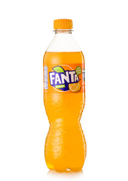 LONDON,UK - MAY 24, 2022: Plastic bottle of Fanta original orange soda on white background.
