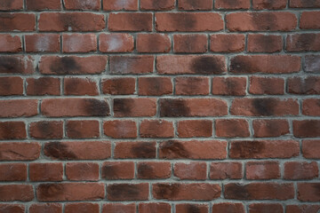 An old brick wall with weather spots.Red brick wall texture grunge background for interior design. High quality photo