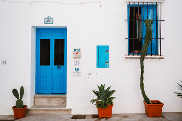 Fototapeta na wymiar Blue door in a small village of Spain