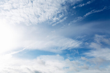 Clear blue sky with clouds. Background. Space for text.