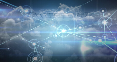 Image of network of connections over clouds and sports stadium