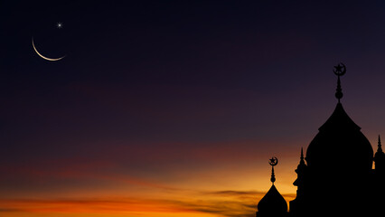 Mosques dome on dusk sky in the evening twilight and crescent moon, religion symbol of Islamic and...