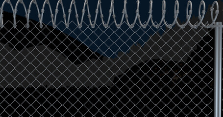 Image of fence with barbed wire over view of mountain