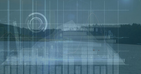 Image of graphs and data processing over landscape with lake