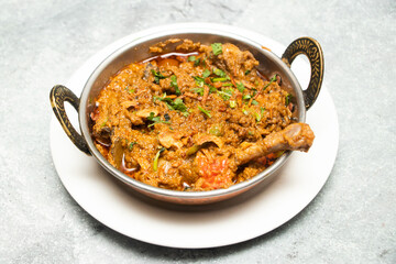 Chicken karahi, indian spicy chicken masala isolated on background top view of pakistani chicken karai