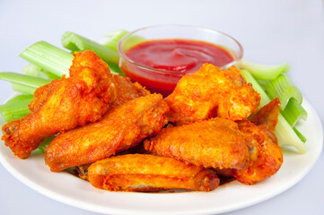 White plate, delicious, tasty, chipotle wings, spicy chicken wings