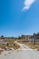 Side Ancient Ruins touristic site in the popular resort town of Side, near Antalya, Turkey. Ancient ruin with Greek amphitheatre.