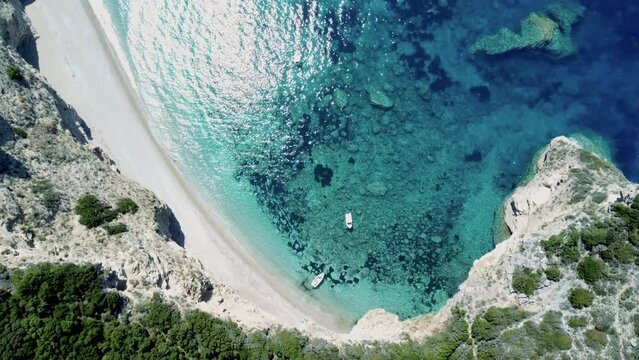 Paradise beach, chomi, Corfu in Greece. Drone shot of a turquoise coloured sea. High quality 4k footage.