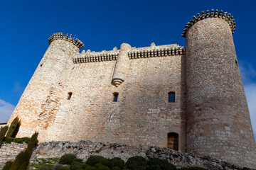 low angle of the great Templar stone castle of the spanish city of Torija