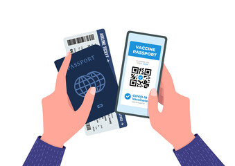 Hands holding a passport and a mobile phone with a health passport application indicating immune people vaccinated with Covid-19 vaccine.