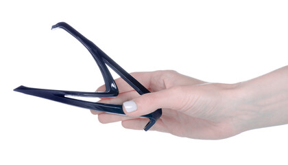 metal holder for bicycle water bottle in hand on white background isolation