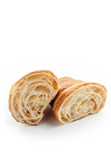 
cut croissant close-up on a white background