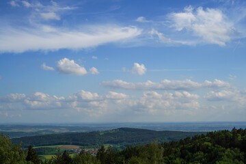 Landscape photos in the Bavarian Forest with fascinating clouds and blue sky