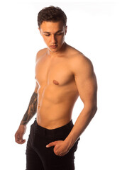 Fototapeta premium Sporty shirtless man isolated on white background