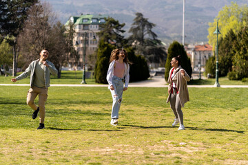 Handsome man and two girls having fun